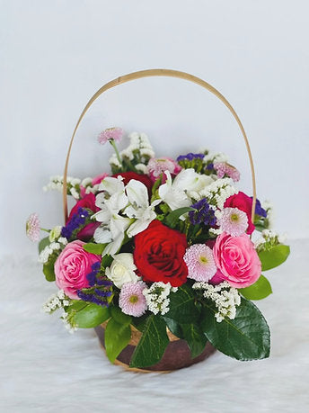 Dazzling Mix Fresh Flowers in a basket