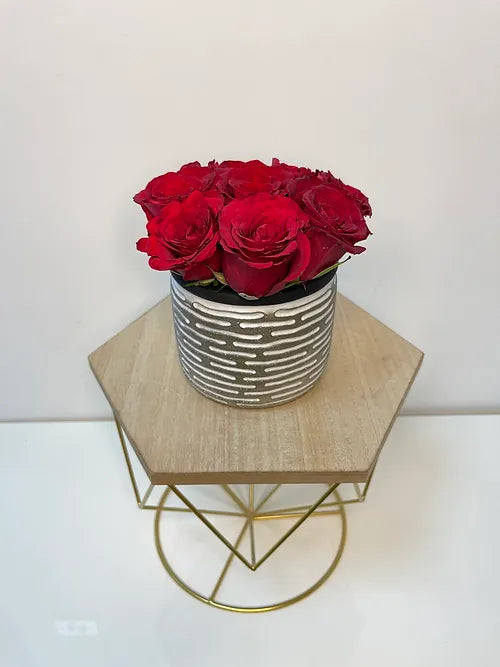 Stunning Red Roses in a Ceramic Vase