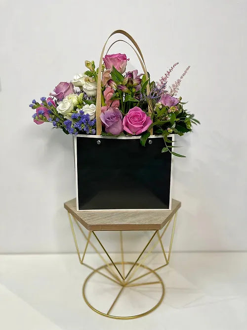 Colorful Fresh Roses in a Flower Bag