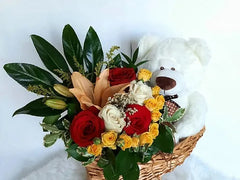 Charming Arrangement in a Woven Boat Basket