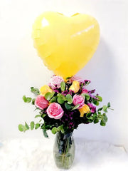 Pink and Yellow Flowers in a Glass Vase