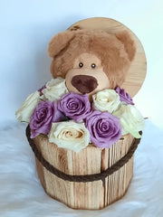 Purple and White Arrangement in a Bucket